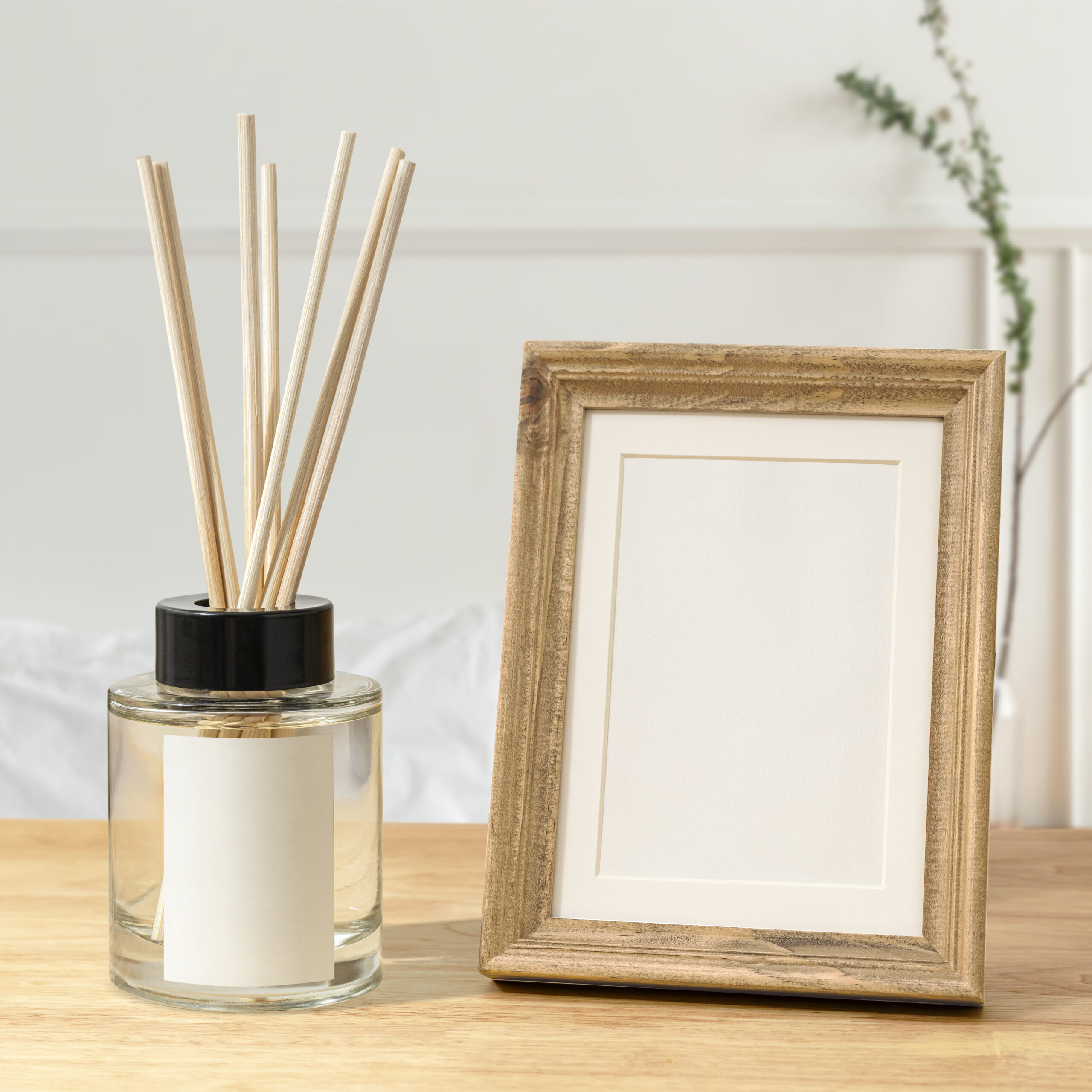 blank decorative picture frame on wooden table
